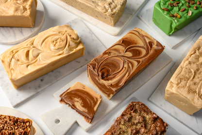 Assorted loaves of fudge on stone platters