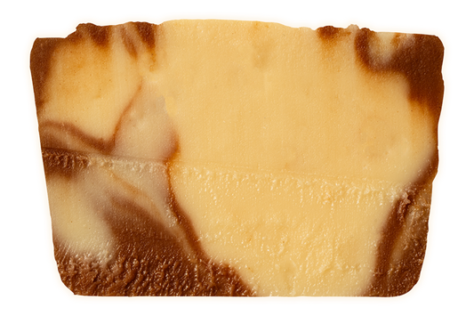 slice of two-tone swirled chocolate cheesecake fudge