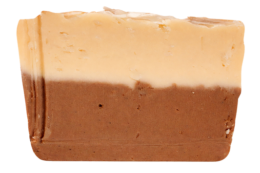 slice of two tone layered chocolate coconut fudge