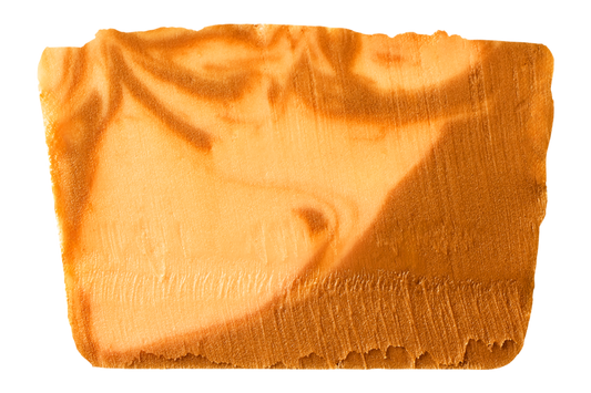 slice of two-tone swirled pumpkin cheesecake fudge