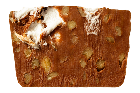 Slice of fudge with marshmallow and nut pieces