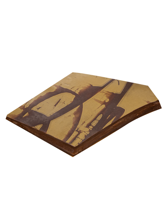 piece of chocolate bark with beige and brown painted pattern on top