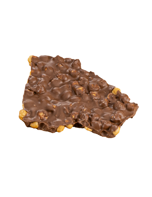 Piece of chocolate bark with hazelnuts  on a transparent background
