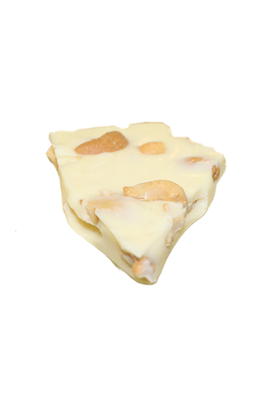 Slice of white chocolate bark with cashews on a transparent background